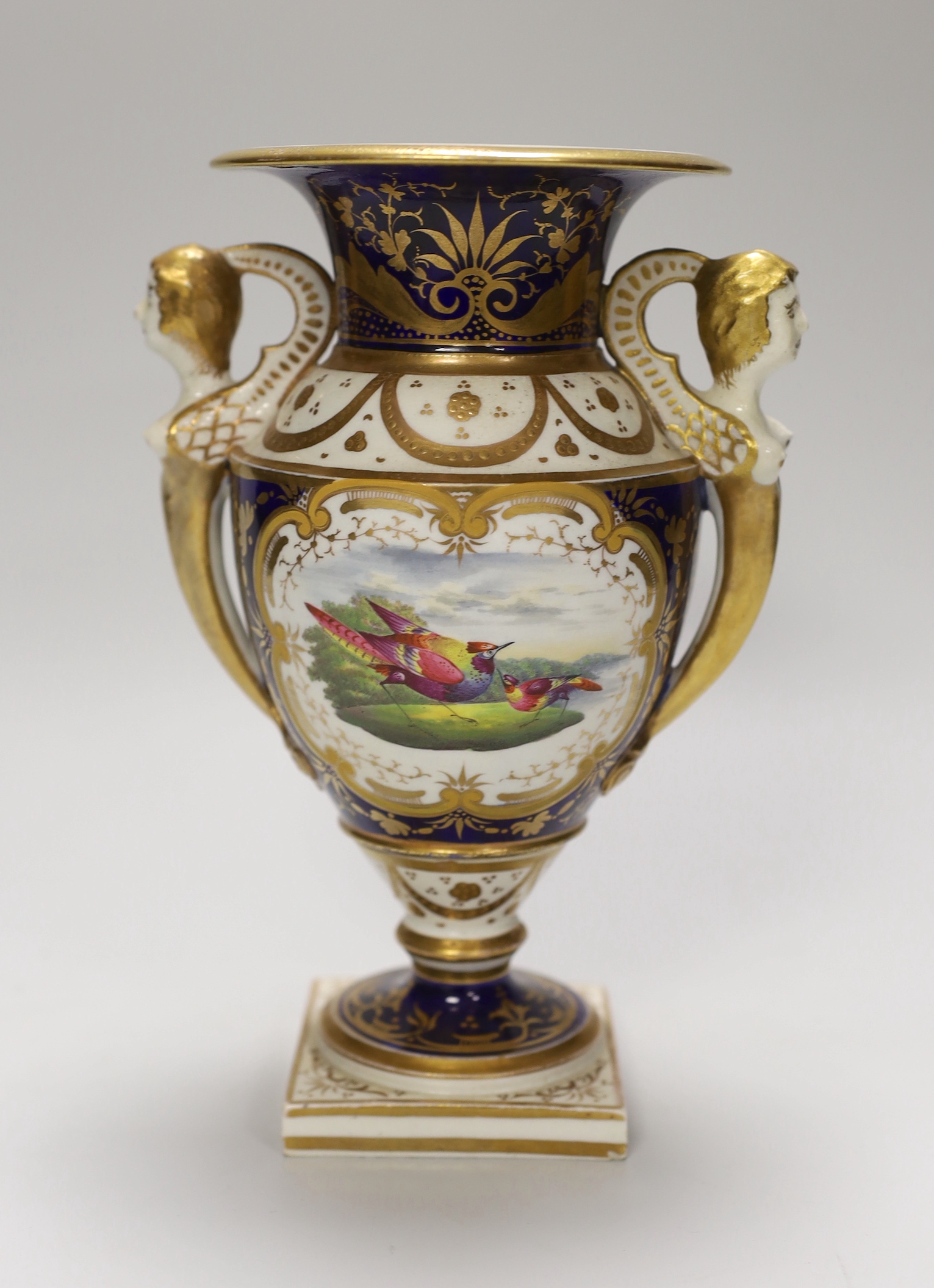 A Chamberlain two handled vase with female bust handles painted with two birds in landscape by Geo. Davis, 20cm high